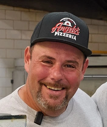 Owner of Angelo's Pizza